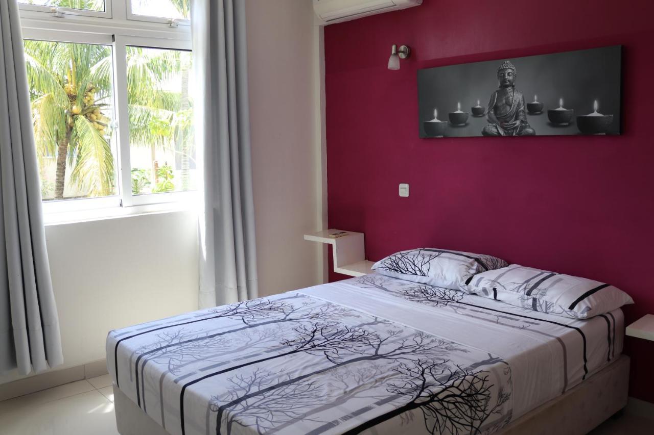 Seacret Bay Apartment Pereybere Beach Bagian luar foto